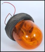 A vintage 20th Century vehicle mounted revolving warning light / lamp by Lucas, retaining original