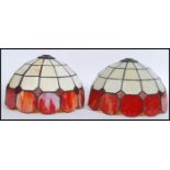 A pair of 20th Century Tiffany style stained glass ceiling / light fixture shades.