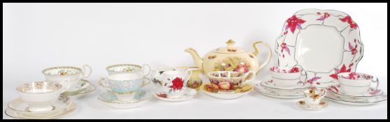 A good collection of vintage 20th Century English fine bone china to include an Aynsley Orchard Gold