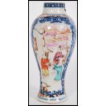 An 18th century Chinese baluster vase having blue and white hand painted decoration with white