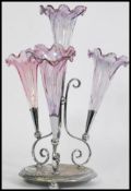 A 19th century Victorian glass and silver plated epergne centre piece, having a central trumpet with