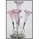 A 19th century Victorian glass and silver plated epergne centre piece, having a central trumpet with