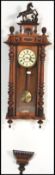 A 19th century Vienna Regulator wall clock having