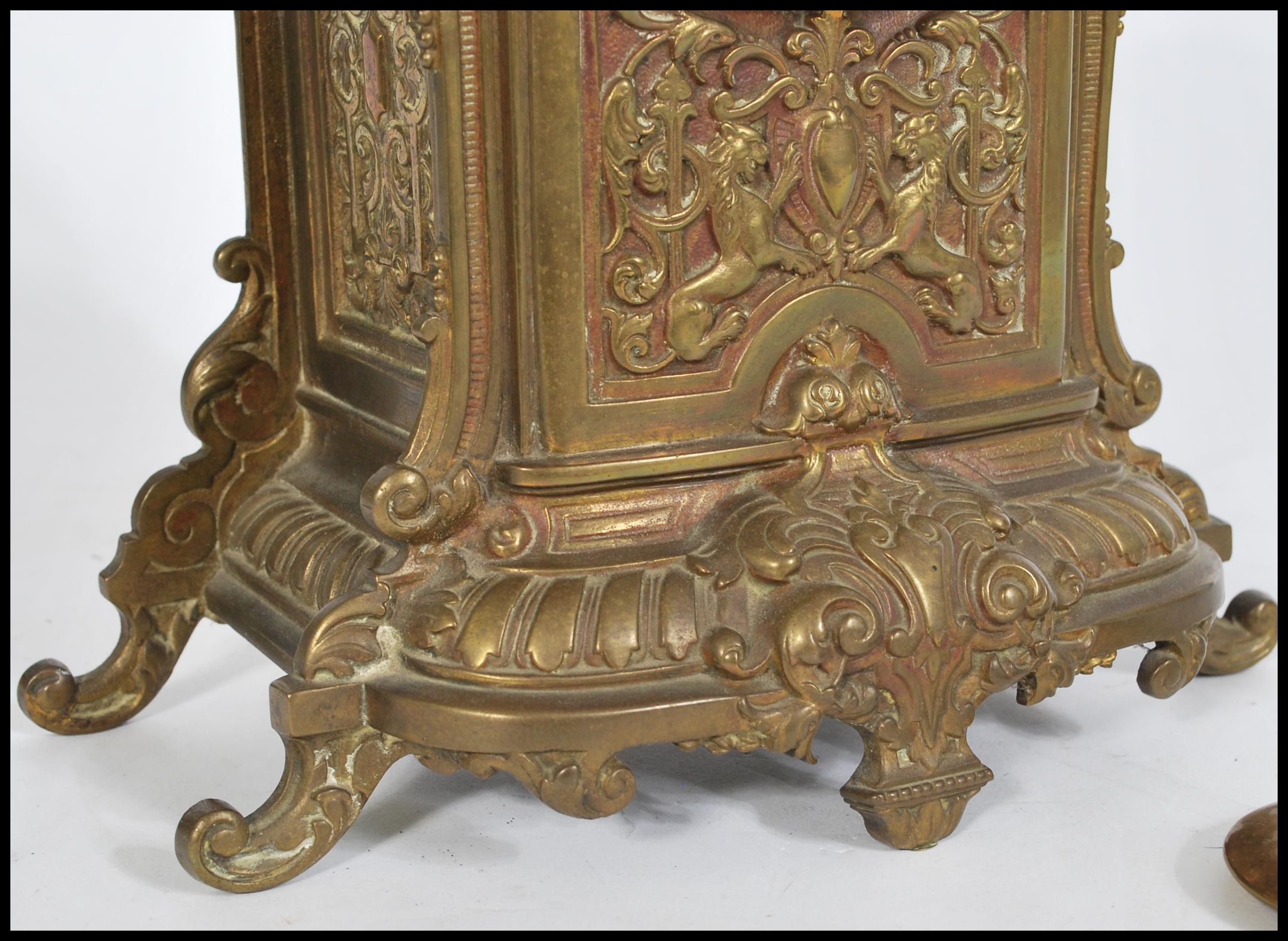 A 19th Century French gilt metal eight day mantel clock striking on a bell, the case ornately cast - Image 3 of 6