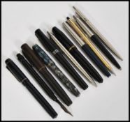 A collection of vintage fountain / lever / ink pens to include a Osmiroid ( 14k nib ), Mentmore (