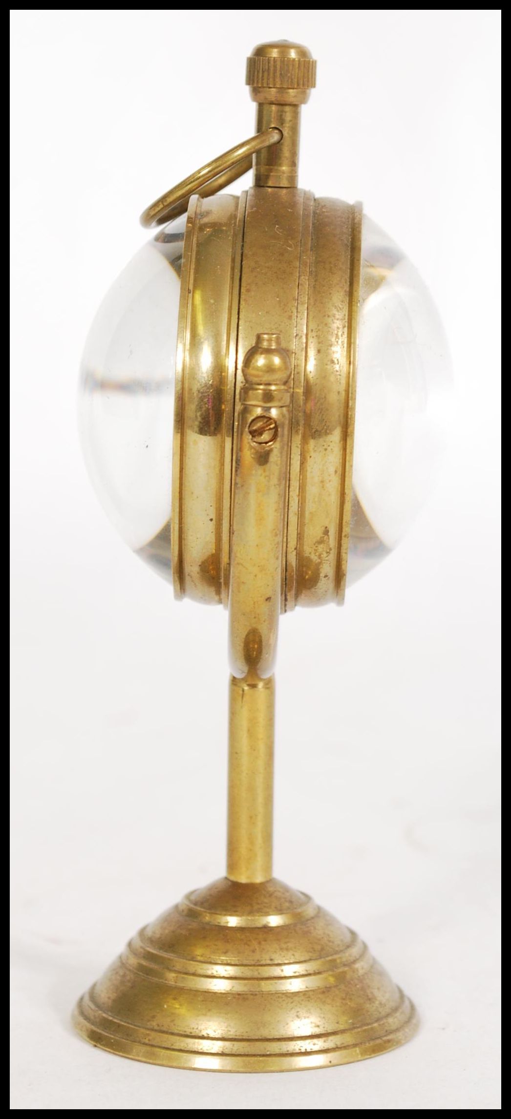 A contemporary brass Roman style fish eye ball clock raised on a brass base with nautical maritime - Image 2 of 5