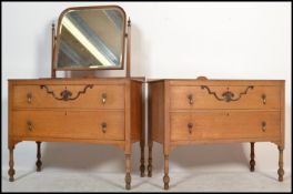 A 1920's Arts & Crafts influenced chest of drawers and matching dressing table chest. Each raised on
