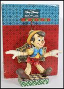 A Disney Showcase '70 years of wishing on a star' Pinocchio puppet figurine, detachable from stand