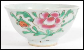 A believed 18th century Chinese finger bowl having hand painted floral sprays and twin concentric