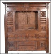 A large 19th century Victorian period continental oak bookcase cabinet. Of solid oak / chestnut