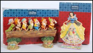 A set of two Snow White and the Seven Dwarves Disney Showcase ornaments to include 'Fairy tale