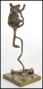 A bronze figurine of a field mouse climbing on a branch on a square base, signed P. R. Northcroft to