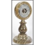 A 20th century grey marble British made desktop/ table Shortland barometer, having a round face with