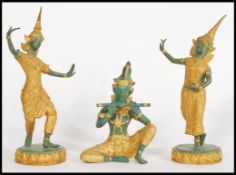 A set of 3 bronze and gilt decorated asiatic - Thai figurine sculptures of Deity's. Each with