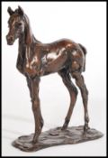 A bronze figurine of a foal on a modeled base by Lucy Kinsella, signed 'Kinsella' to the base,