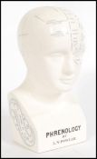 A contemporary Phrenology head / bust with notation by LN Fowler, further details to the sides and