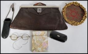 A stunning collection of items to include a mother of pearl calling card case, an Art Deco leather