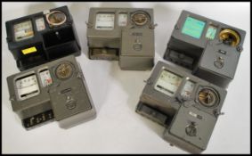 A group of five vintage 20th Century coin operated electricity meters, different makes and models.