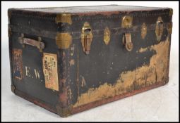 A good early 20th century blue brass bound steamer trunk chest with clasp handles, brass bindings