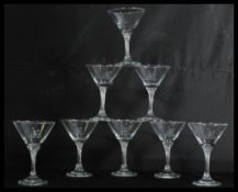 A collection of eight vintage 20th Century advertising point of sale cocktail glasses for