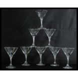 A collection of eight vintage 20th Century advertising point of sale cocktail glasses for