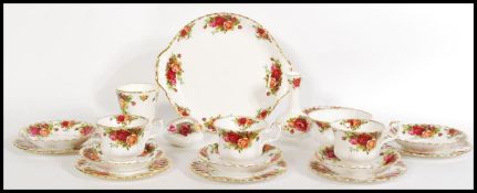 A vintage 1960's Royal Albert bone China tea service in the Country Roses pattern to include side