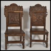 A pair of 19th century armorial carved oak hall /