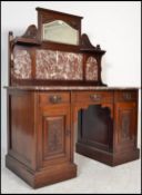 A Victorian mahogany Art Nouveau marble top washstand - desk. Each pedestal with chest of drawers on