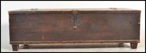 A believed 19th century oak sword box - coffer chest of angular form with shaped body having