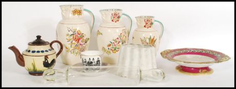 A set of 3 Victorian graduating jugs together with a 19th century tazza in the manner of