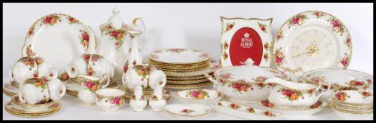 An extensive part coffee / dinner service of Royal Albert bone China in the Country Roses, to