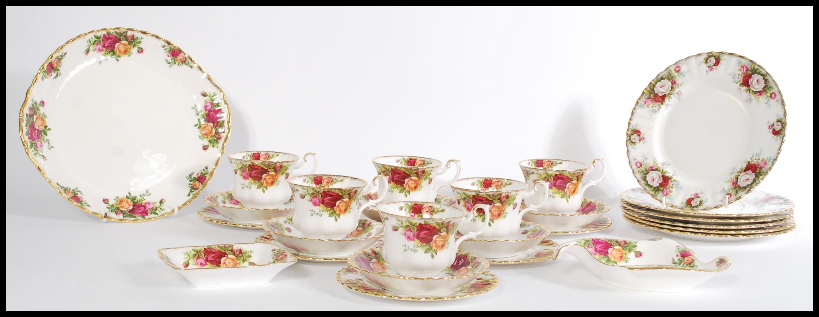 A vintage Royal Albert tea set in the old Country roses pattern to include six cups and saucers, six