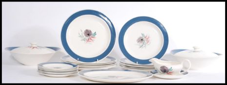 A Susie Cooper dinner service in the Blue Dahlia pattern 2413 to include dinner plates, side plates,