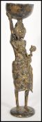 An unusual large African tribal bronze figurine sculpture of a woman carrying baby having large