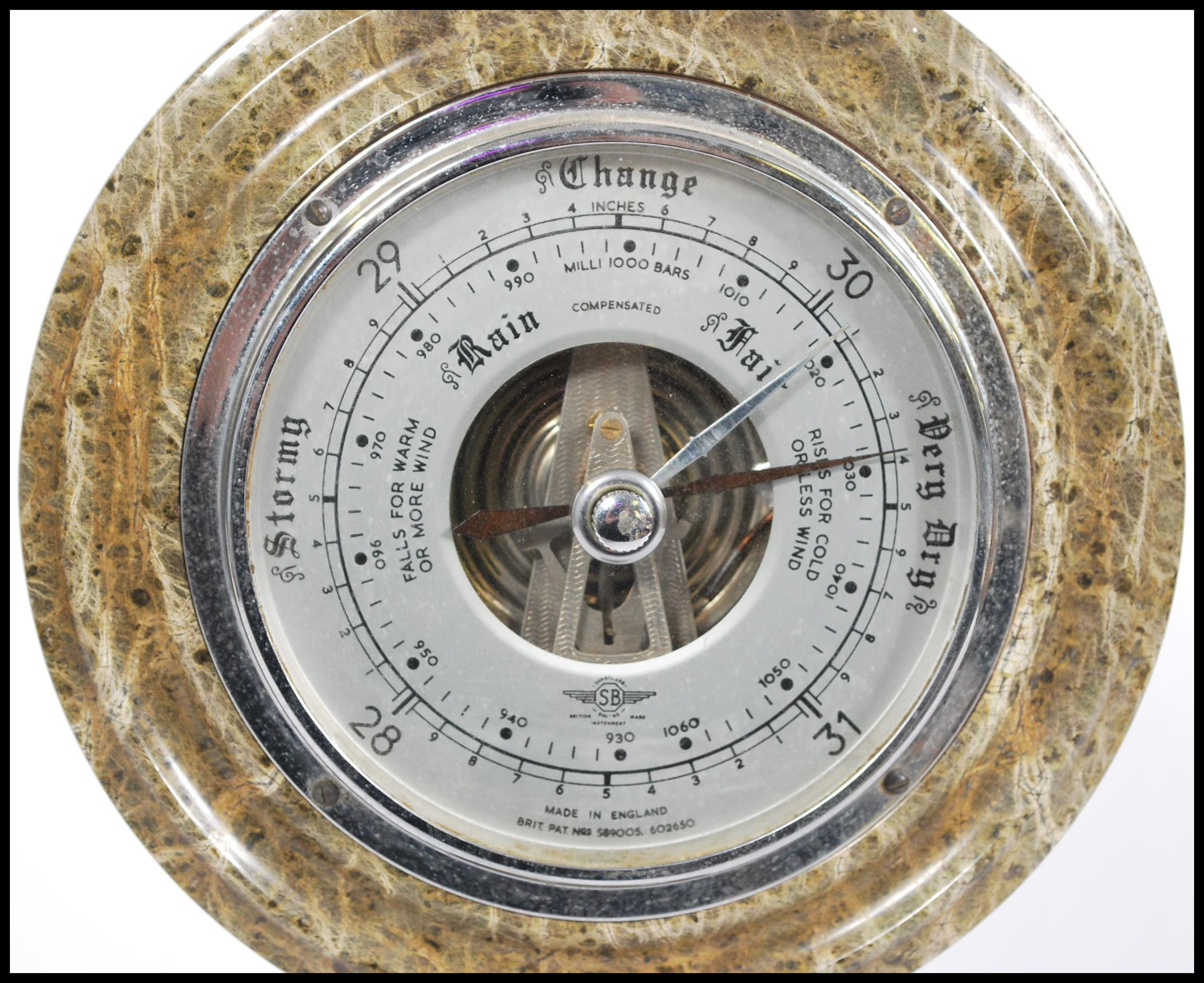 A 20th century grey marble British made desktop/ table Shortland barometer, having a round face with - Image 2 of 5