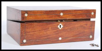 A 19th century mahogany writing slope box with inl