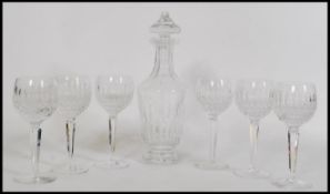 A set of six Waterford leaded cut glass crystal wine glasses together with an unassociated cut glass