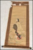 A believed 19th century / early 20th century Japanese scroll with watercolour depicting a Geisha