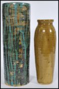 John Jenvey - Two 20th Century studio pottery vases by of tall cylindrical form, the tallest