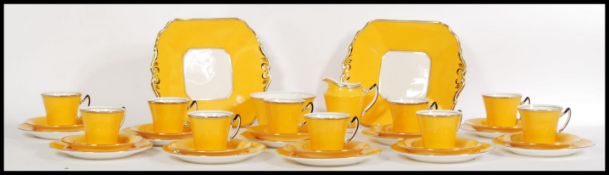 A vintage twelve person Duchess china tea service consisting of twelve cups and saucers sandwich