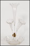 A 19th century Victorian glass epergne centre piece, having a central trumpet with frilled rims