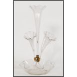 A 19th century Victorian glass epergne centre piece, having a central trumpet with frilled rims