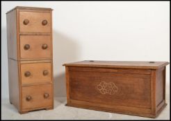 A vintage 20th Century oak blanket box / coffer, panel sides and front with hinged top together with