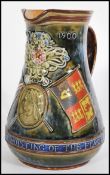 A Lambeth Doulton Boer War commemorative jug, dated June 5th 1900, bears the wording `In