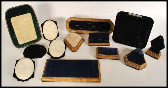 A selection of shop jewellery display units including a ring tray, necklace display, and counter
