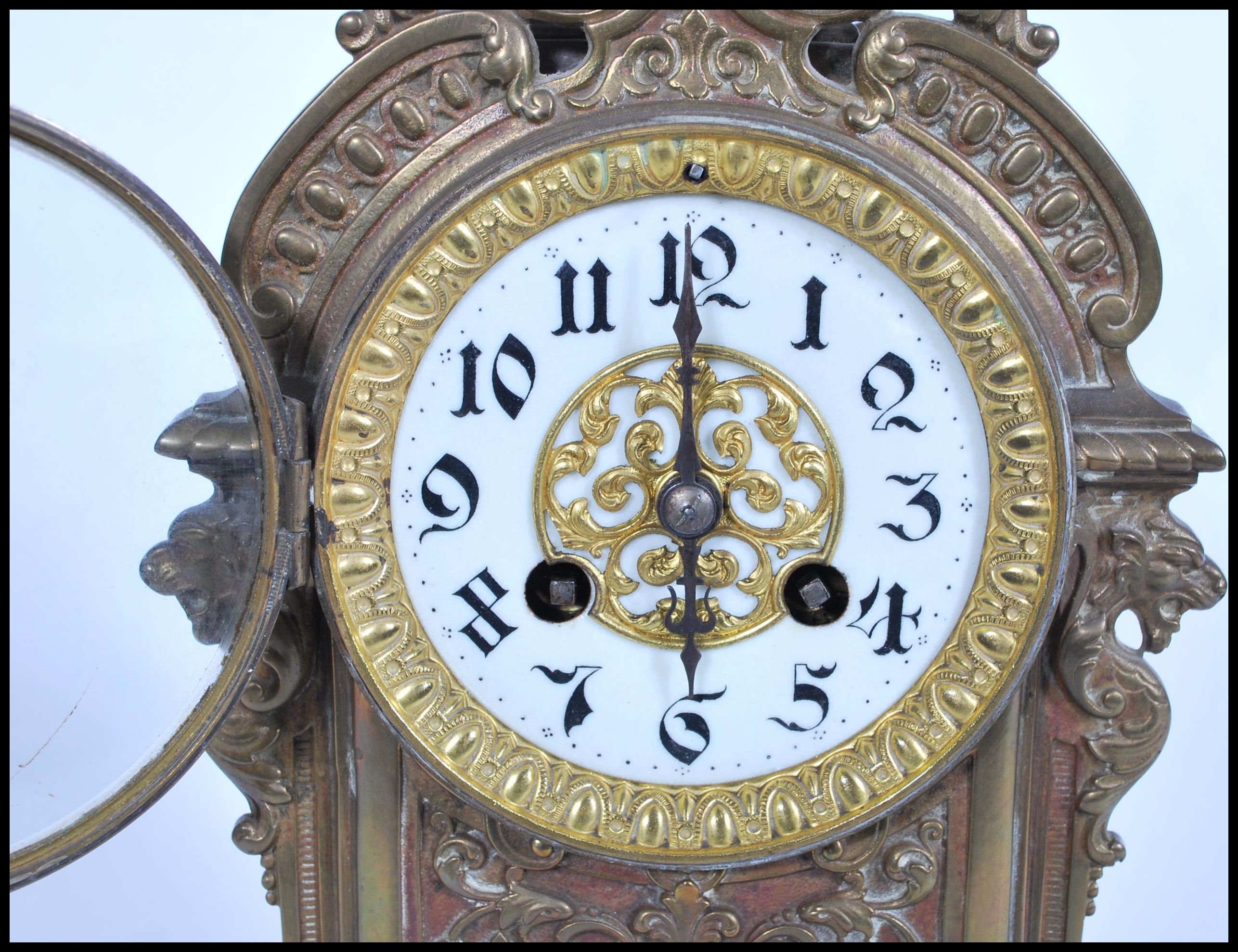 A 19th Century French gilt metal eight day mantel clock striking on a bell, the case ornately cast - Image 4 of 6