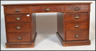 A Victorian walnut partners desk three short drawers above the knee hole flanked by three further