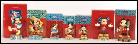 A selection of Disney Showcase Mickey Mouse related figurines to include 'Yankee Doodle Mickey'