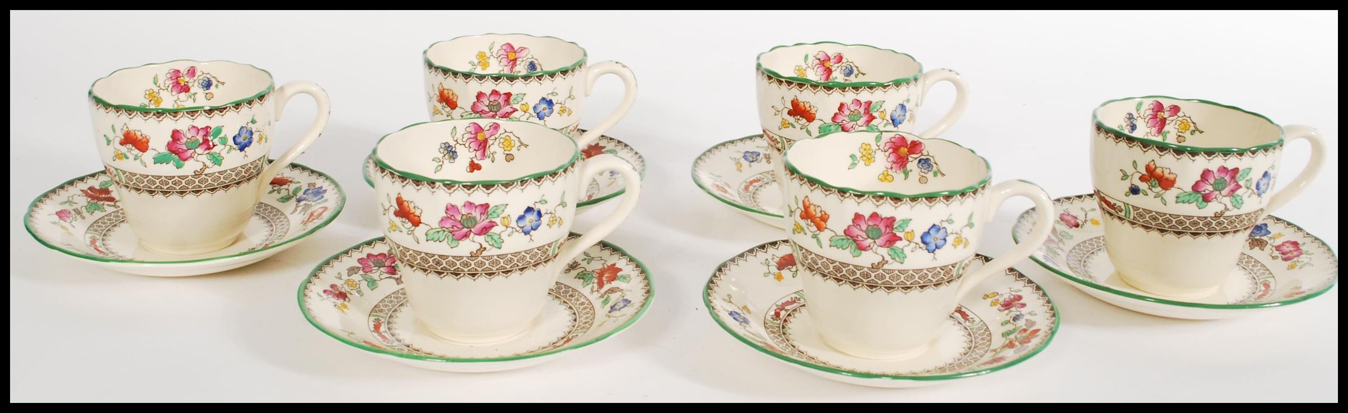 A set of six 19th century Copeland and Spode tea cups and saucers decorated in the Chinese Rose