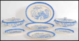 A 19th Century Victorian part blue and white dinner service, to include graduating platters, tureen,